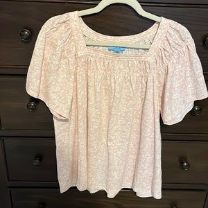 Womens t-shirt material top. Pretty square neck with fluttered short sleeves.